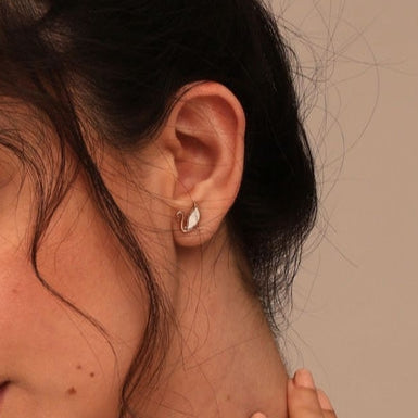 Swan rosegold plated stud earrings